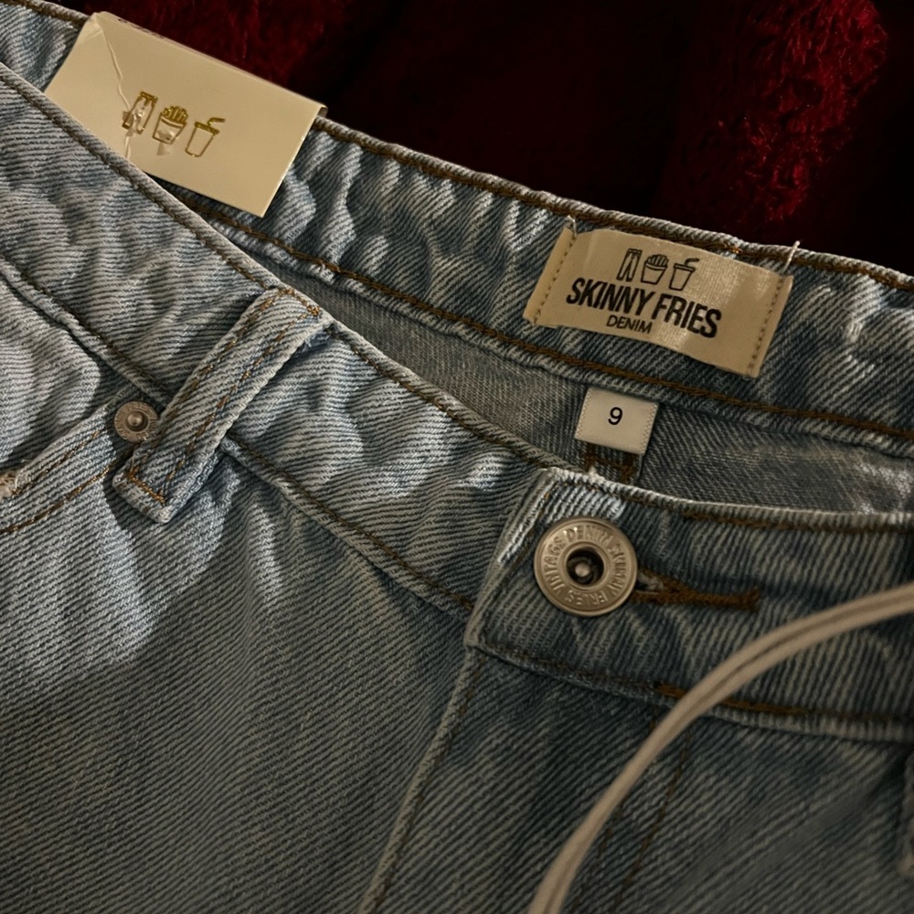 12 fits like a 9, never worn